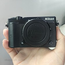 Nikon 1 J5 Touchscreen 20.8 MP Mirrorless Digital Camera Body with Accessorries