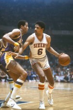 Julius Erving of the Philadelphia 76ers dribbles1980's Basketball Photo