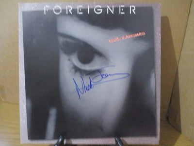 FOREIGNER signed/autographed Vinyl Record Album...MICK JONES