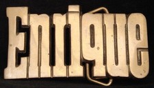 LC14113 NOS VINTAGE 1970s/80s CUT-OUT NAME ENRIQUE SOLID BRASS BUCKLE
