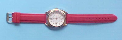 VINTAGE GOSSIP WRISTWATCH SILVER TONE CASE AND RED LIKE BAND  display picture 1
