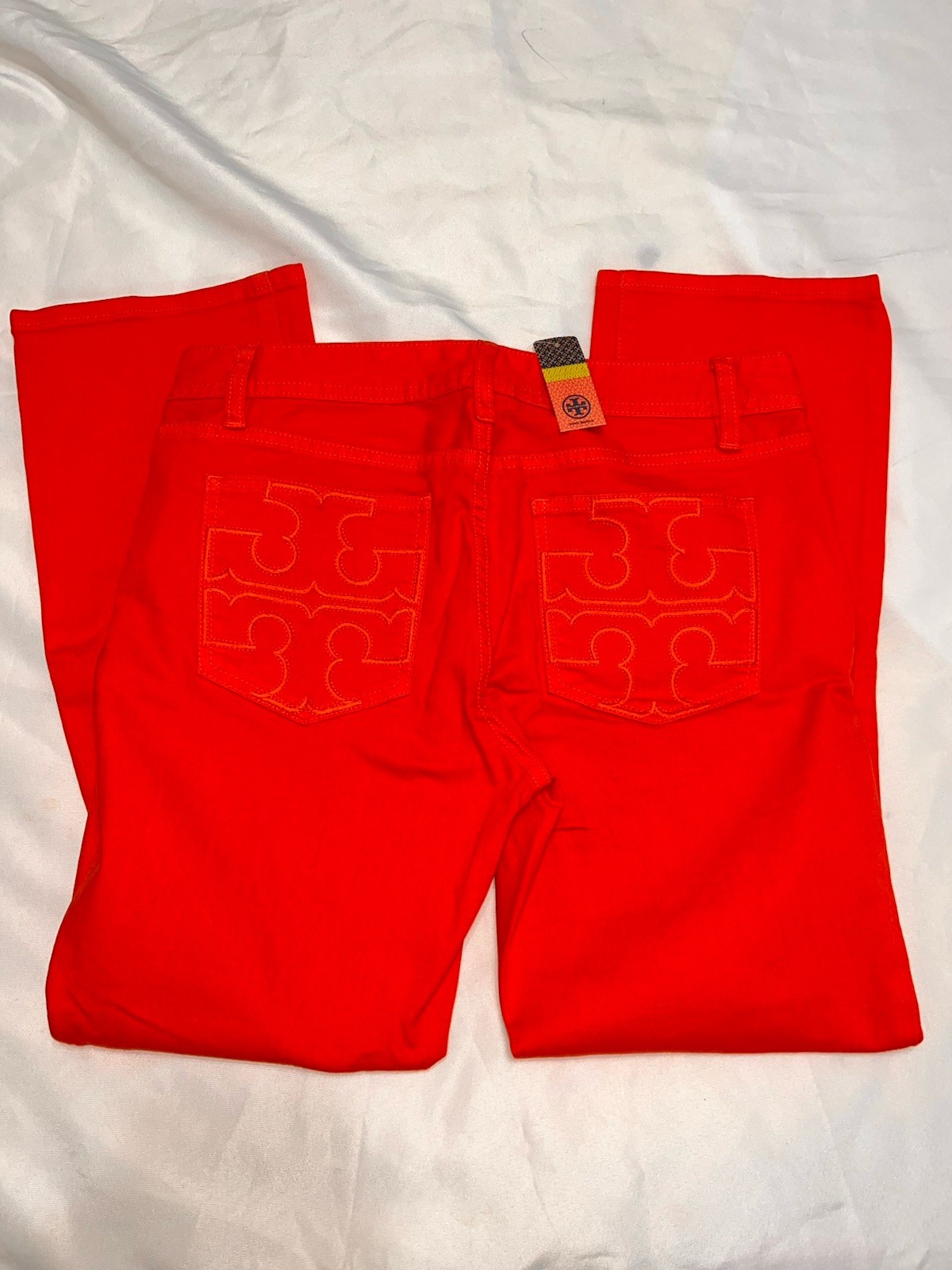 NWT Tory Burch red  cropped slim boot Cut jeans. Size 28. Inseam is 26.5”
