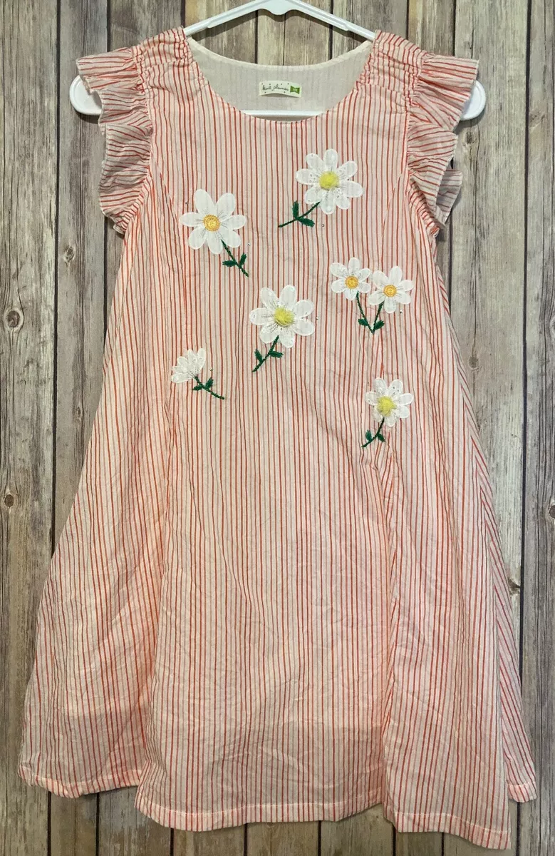 White dress top with orange flowers