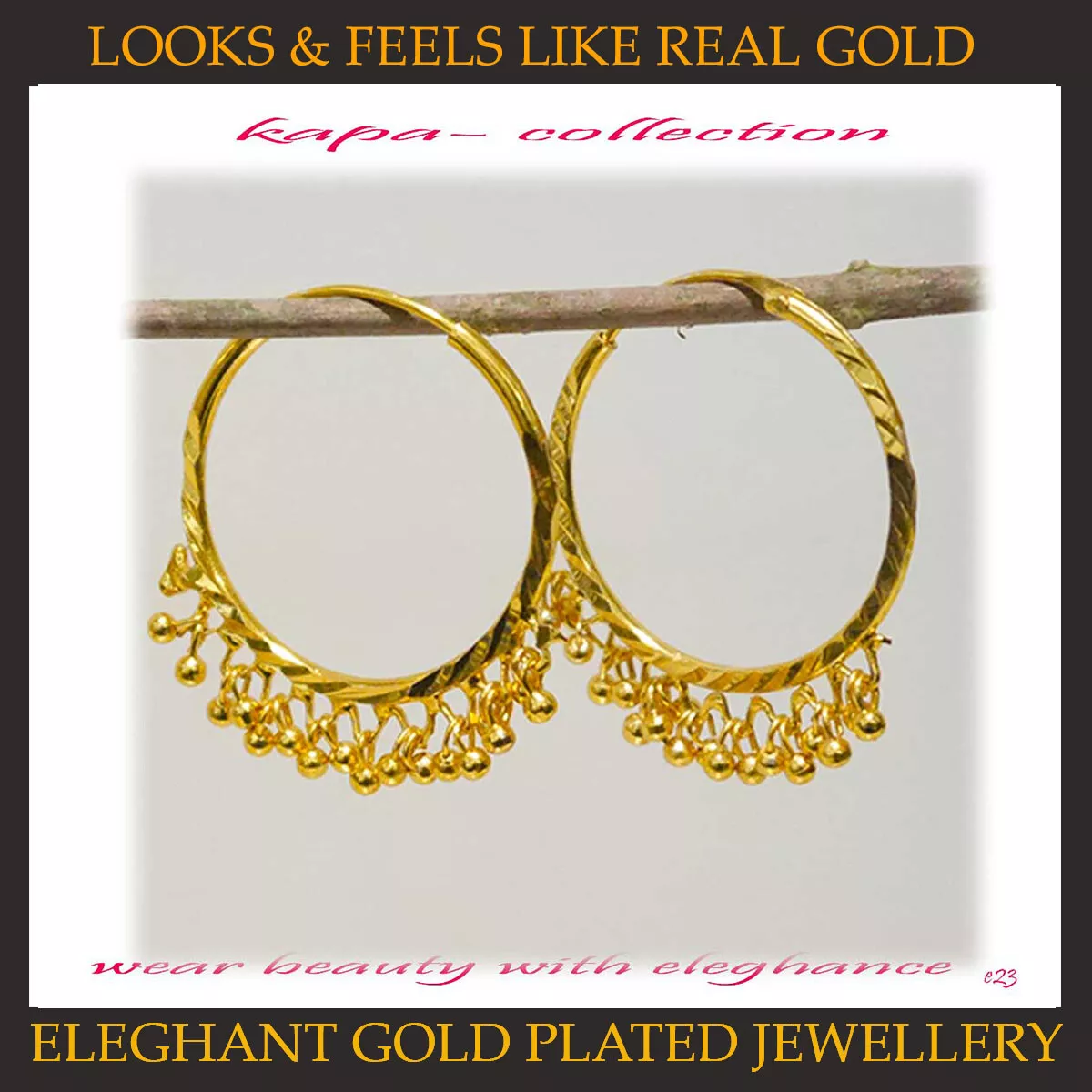 Designer hoop clearance earrings gold