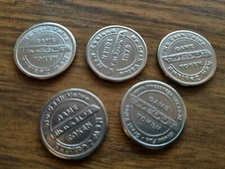 Bulk lot of 5 arcade tokens - Time Out New Zealand