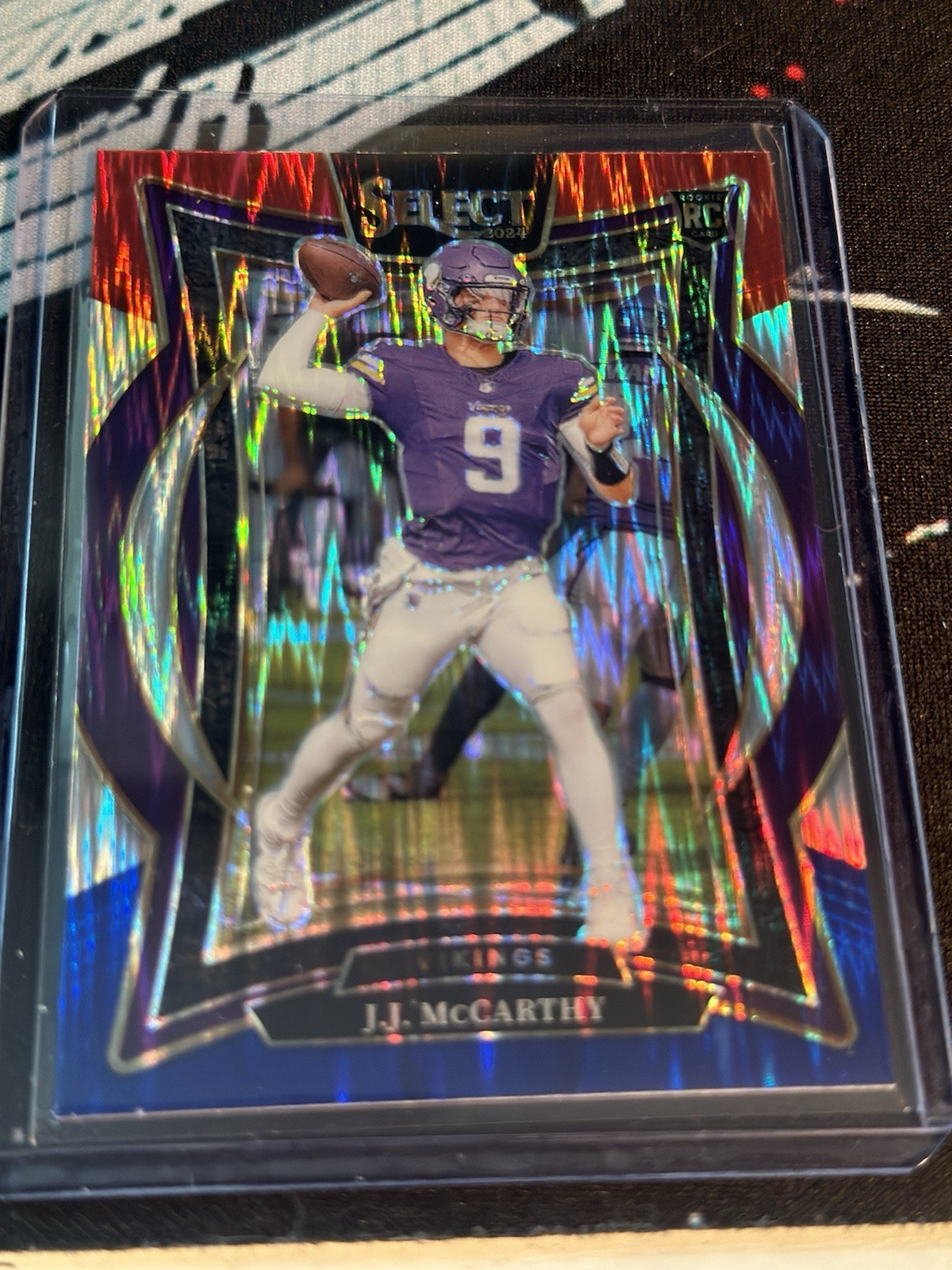 2024 Panini Select - Concourse J.J. McCarthy #24 Red & Blue Shock Prizm (RC)