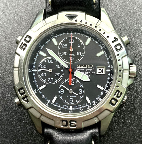 SEIKO CHRONOGRAPH BLACK DIAL QUARTZ WATCH 7T32-7F70 Serial #000314 - VERY NICE