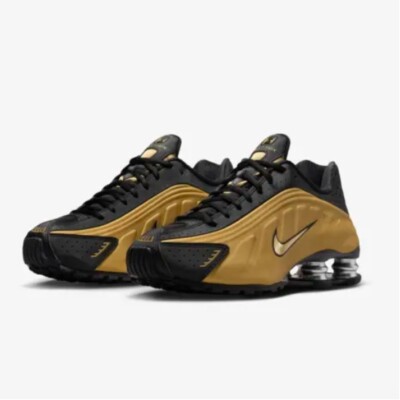 nike shox tl black gold