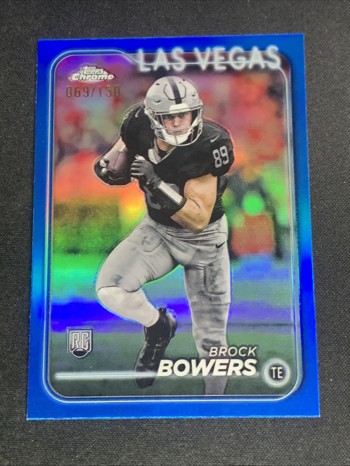 2024 Topps Chrome Football Brock Bowers No. 207 Blue Refractor /150 RC Raiders