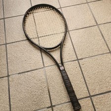 Wimbledon tennis racket, hard, black