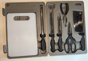 Fishing and game processing knife set in hard plastic case by Maxam.