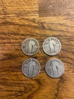 Us silver quaters . 4 standing liberty quarters .9 ounces of 90% silver