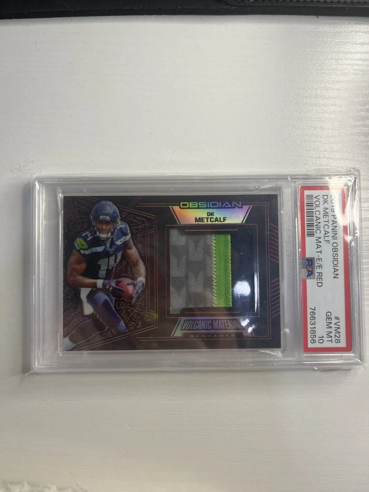 DK Metcalf Panini Obsidian Volcanic Material #VM28 Electric Etch Red