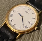 Vintage Seiko 7N39-0A19 Gold Tone Men's Dress Watch White Roman Dial Quartz