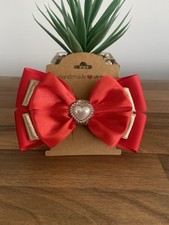 Clip Set On Three Layers Of Fabric With Diamante Pearl Heart In The Centre