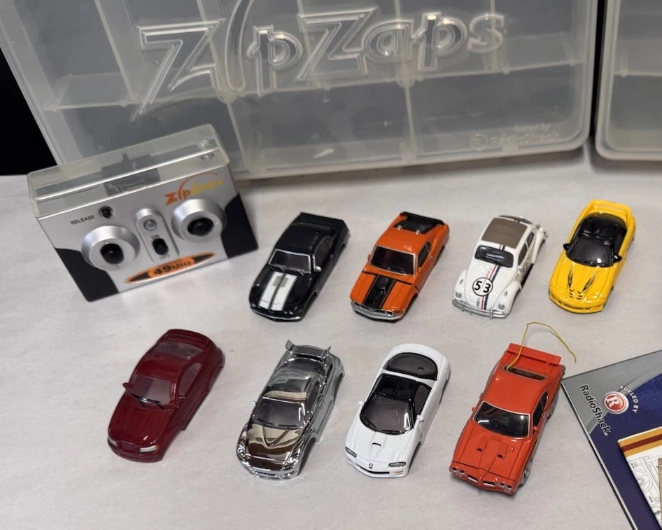 Large Lot of Zip Zaps Micro RC's 8 Bodies, Wheels & Tires, 2 Cases Etc. - Image 2 of 3