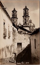 Vintage RPPC Taxco Mexico Santa Prisca Church Street Scene with Man in Sombrero