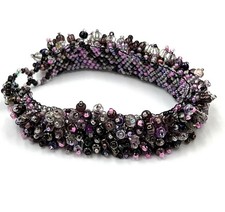 Handcrafted bracelet featuring a delicate mix of tiny beads and small crystal