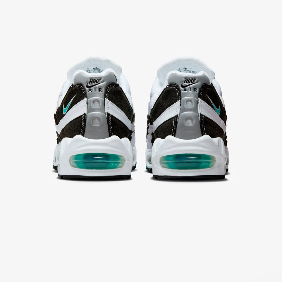 Jordan Hydro Xi Slides para Hombres_Negro/Azul Gamma-Maíz Universitario Im7409-100 Foto 3 de 4