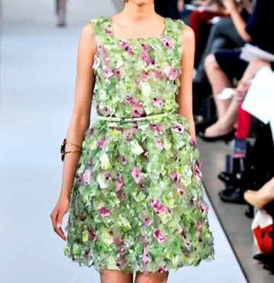 oscar de la renta green sequin dress A new season, a new facture. In the #odlratelier, sequins are woven for #odlrspring 2025. Oscar de la Renta Spring 2025 arrives tomorrow., Video by @maxwellswift