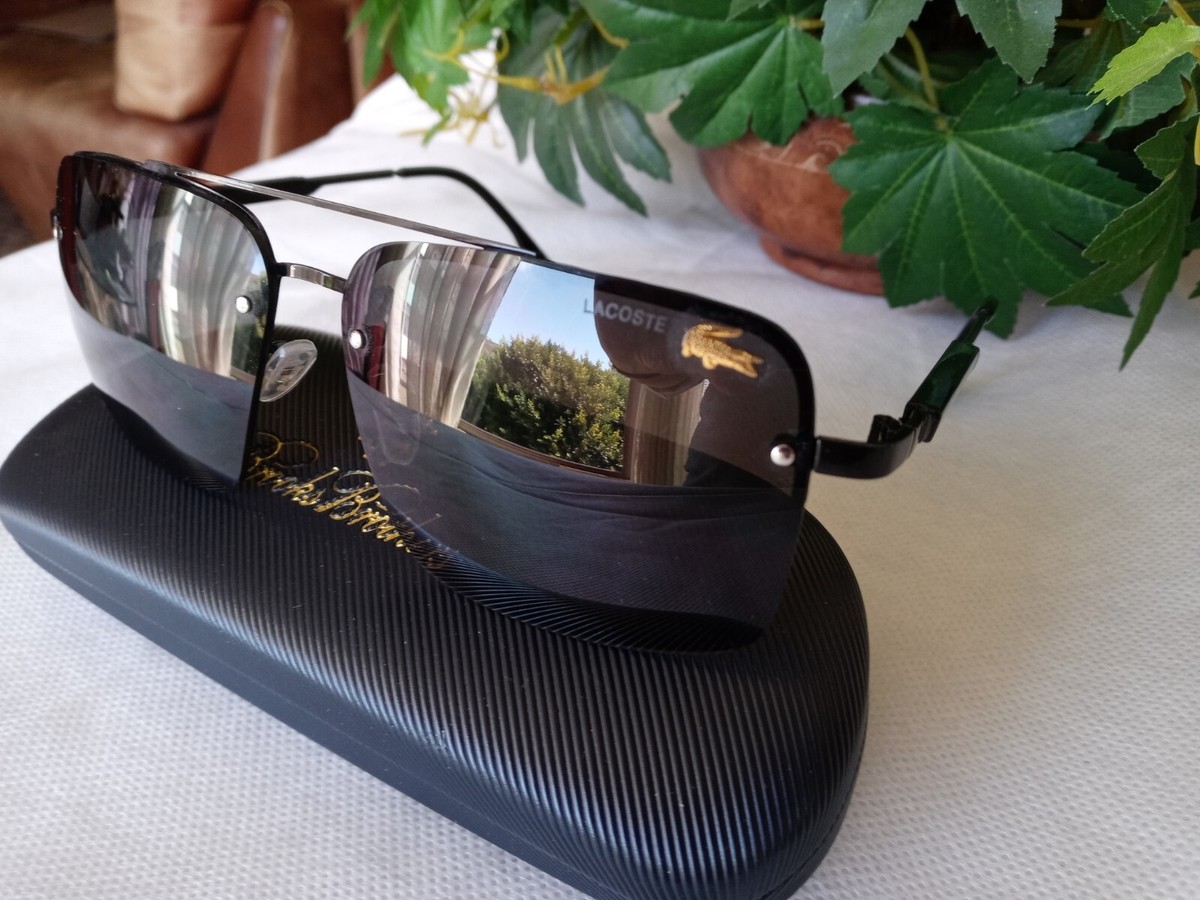 Lacoste ブラック サングラス LACOSTE Mens Sunglasses RECTANGULAR, Black, Rimless, Gold LOGOs