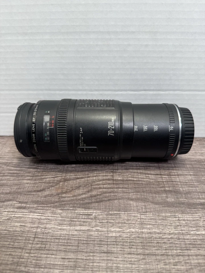 Lente zoom Canon EF 70-210 mm 1:4 con tapas de lente y teleconvertidor TC - DC58N 1,75x Foto 3 de 4