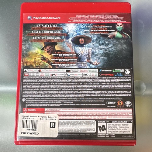 PS3 Mortal Kombat Komplete Edition Greatest Hits case with red spine, character art, and Warner Bros. logo.