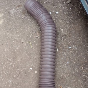 Brown Plastic Downspout Extension Tube