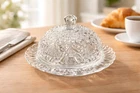 Vintage clear pressed glass round butter dish with domed lid.