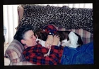 Vintage Photograph Woman Cuddling Cute Puppy Dog on Couch
