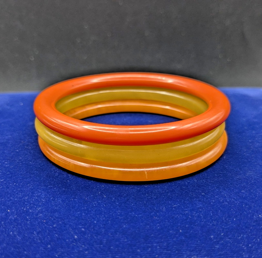 Bakelite Stacking Spacer Bangles Set Marbled Oran… - image 1