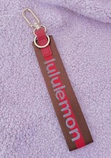 Lululemon Brown and Desert Red Neverlost Key Chain lanyard new