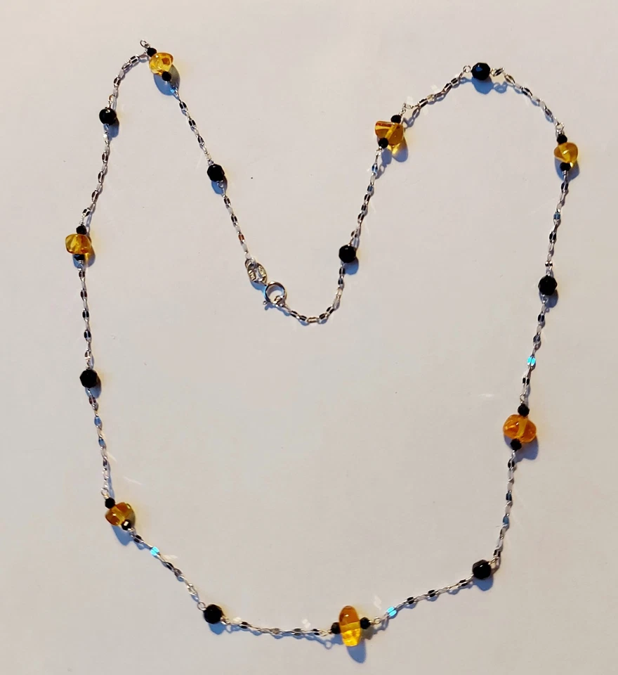 collana in argento 925 e pietre con ambra grezza naturale onice nero sfaccettato - Immagine 2 di 4
