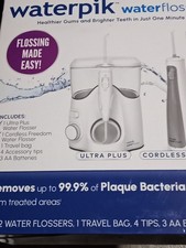 Waterpik Ultra Plus Cordless Freedom Water Flosser w/ Travel Bag Accessories