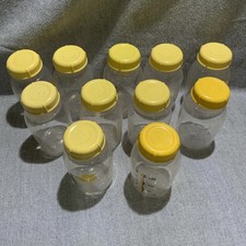 Medela Breastmilk Bottle Set 11 Bottles 5oz Clear Bottles Yellow Cap