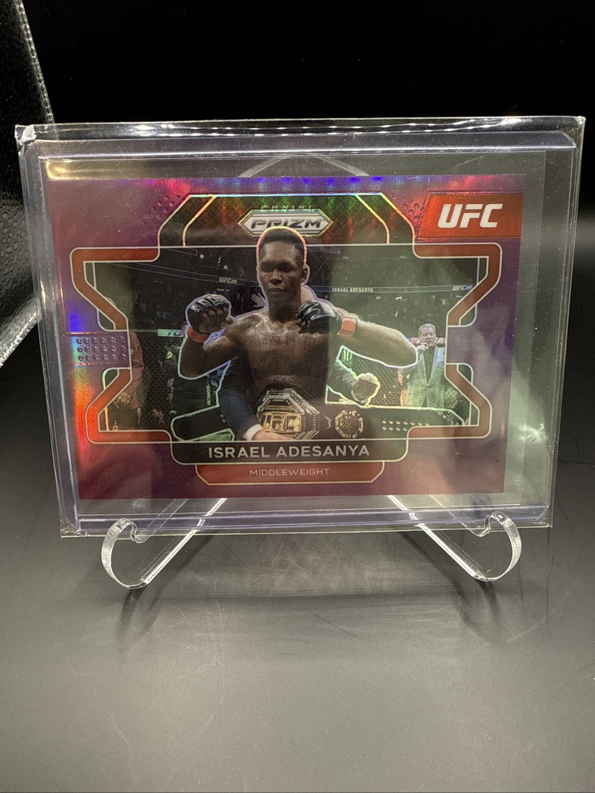 Israel Adesanya 2022 Panini Prizm UFC #23 Purple Holo SP #d/149 Middleweight