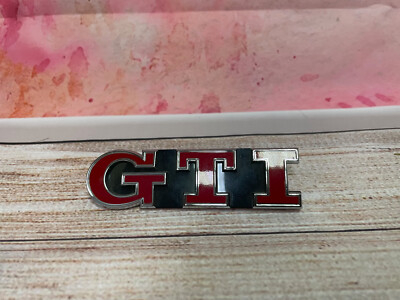 VW Golf 7 5G GTI Schriftzug schwarz - Chrom-Rot