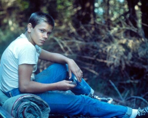 River Phoenix in t-shirt \u0026 jeans seated 