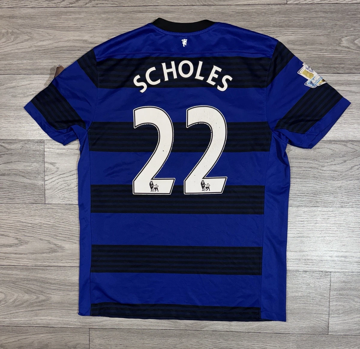 Preços baixos em Tamanho G Azul Manchester United International