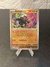 Holofoil - Okidogi (Poke Ball Pattern) - 057/131 - SV: Prismatic Evolutions - NM