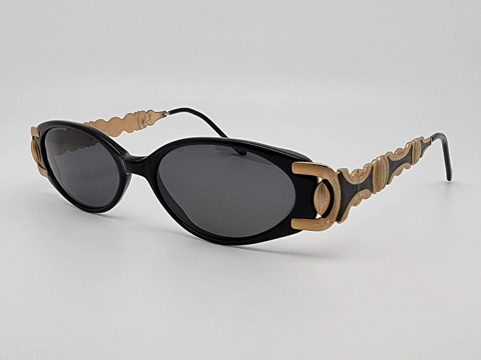 Gafas de sol vintage Revlon Sun 12 marco negro dorado lentes grises 50-16-140 Foto 3 de 4