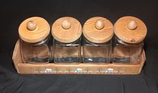 Vintage Set of Four Glass Canisters with Wooden Lids and Matching Wooden Caddy