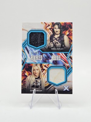 Liv Morgan / Rhea Ripley 2025 Topps Exalted WWE Rivaled Relics Aqua SP #/99