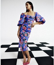 $1890 Carolina Herrera Floral Stretch-Cotton Balloon Sleeve Midi Dress. Italy