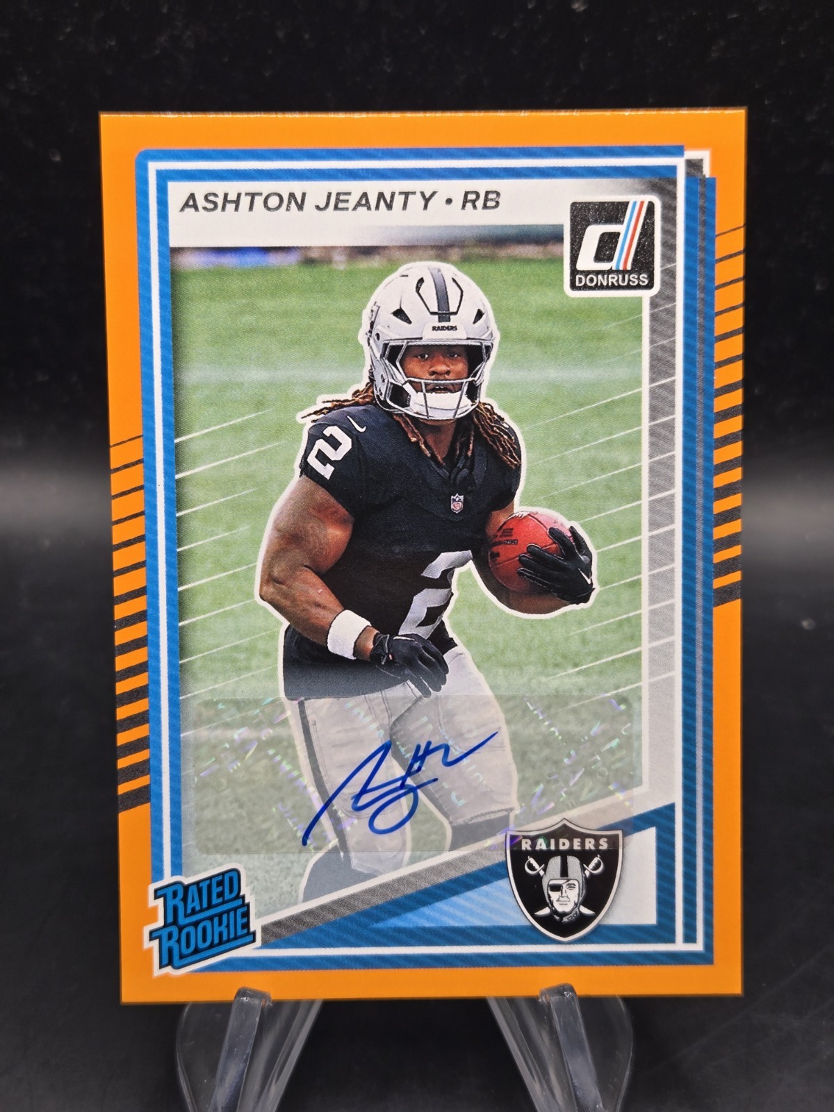Ashton Jeanty Raiders 2025 Panini Donruss Rated Rookie #305 Orange Autograph