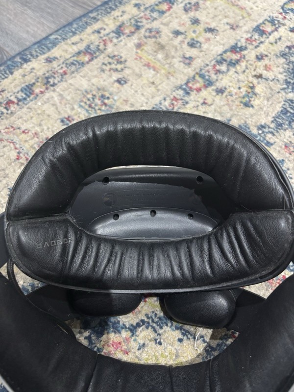 Meta quest 2 with controlled, Bobovr battery headstrap and Bobovr oasis face pad