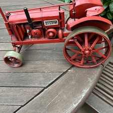MODEL TRACTOR BY FARMALL TINPLATE / PRESSED STEEL   13.5 L x 7.5 H x 6.5 W.