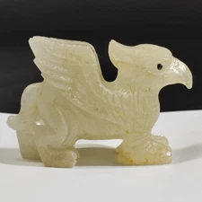 Natural crystal quartz mineral raw stone, hand carved Griffin