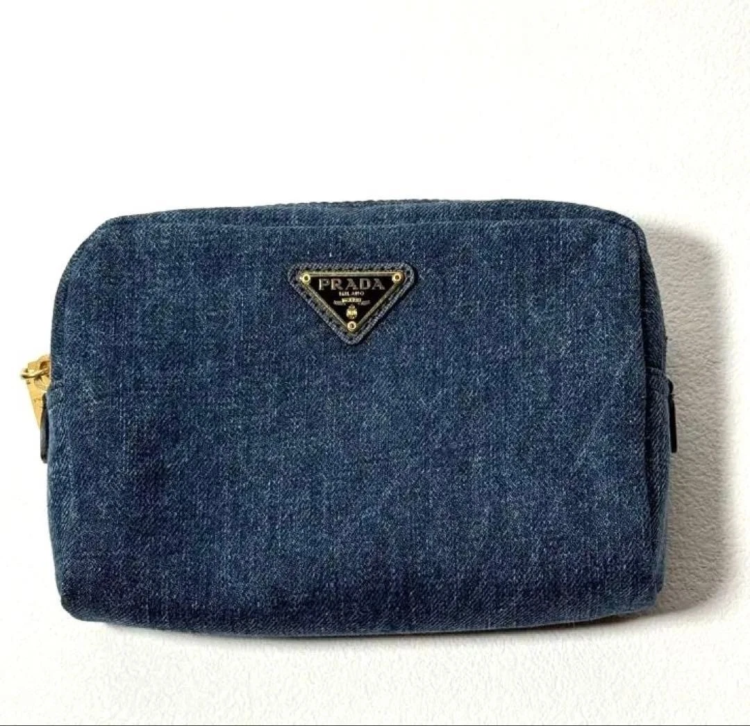 PRADA ネイビー ポーチ キャンバス PRADA Logo Canapa Cosmetic Pouch in blue denim and leather