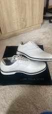 White men’s golf shoes brogue lace up style with brown trim round the shoes, 